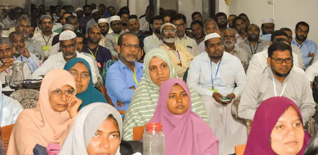 Men and women participants at a conference